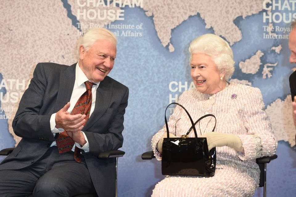 Sir David Attenborough talks to The Queen at an event in London in 2019. (PA)