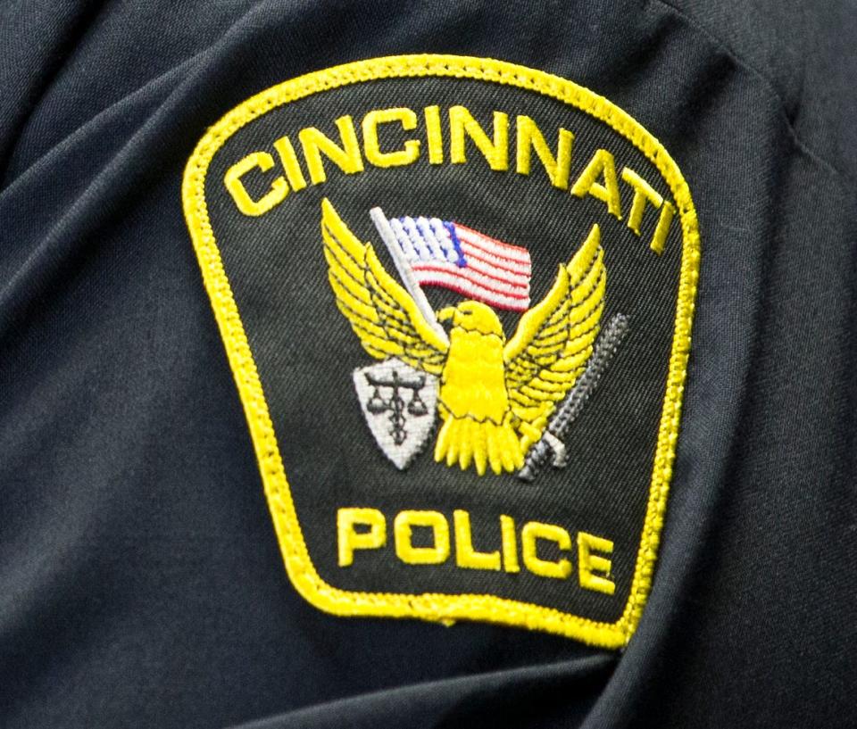 A Cincinnati police officer is undergoing a "painful" preventative rabies treatment after she was bitten by a dog, the police union said.