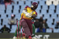 West Indies's batsman Kyle Mayers plays a stroke shot during the first T20 cricket match between South Africa and West Indies, at Centurion Park, in Pretoria, South Africa, Saturday, March 25, 2023. (AP Photo/Themba Hadebe)
