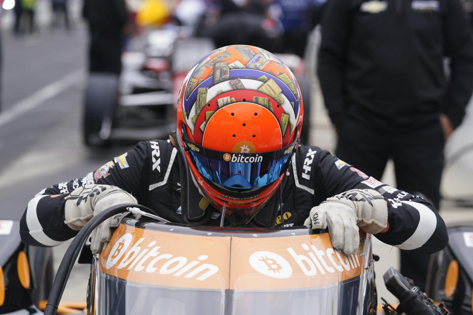 Rinus VeeKay, of the Netherlands, climbs into his car during the final practice session for the Indianapolis 500 auto race at Indianapolis Motor Speedway, Friday, May 28, 2021, in Indianapolis. (AP Photo/Darron Cummings)