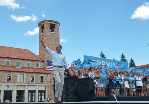 US President Barack Obama waves as he arrives for a campaign event at the University of Colorado in Boulder. Obama said that Romney, with whom he is neck and neck in the polls ahead of the November election, had refused to reveal the "secret sauce" that would help him create jobs: "he did not offer a single new idea."
