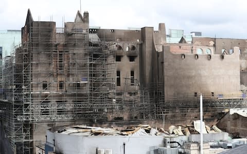 Exterior view of the fire damage at the Glasgow School of Art (GSA) in the historic Mackintosh Building - Credit: PA