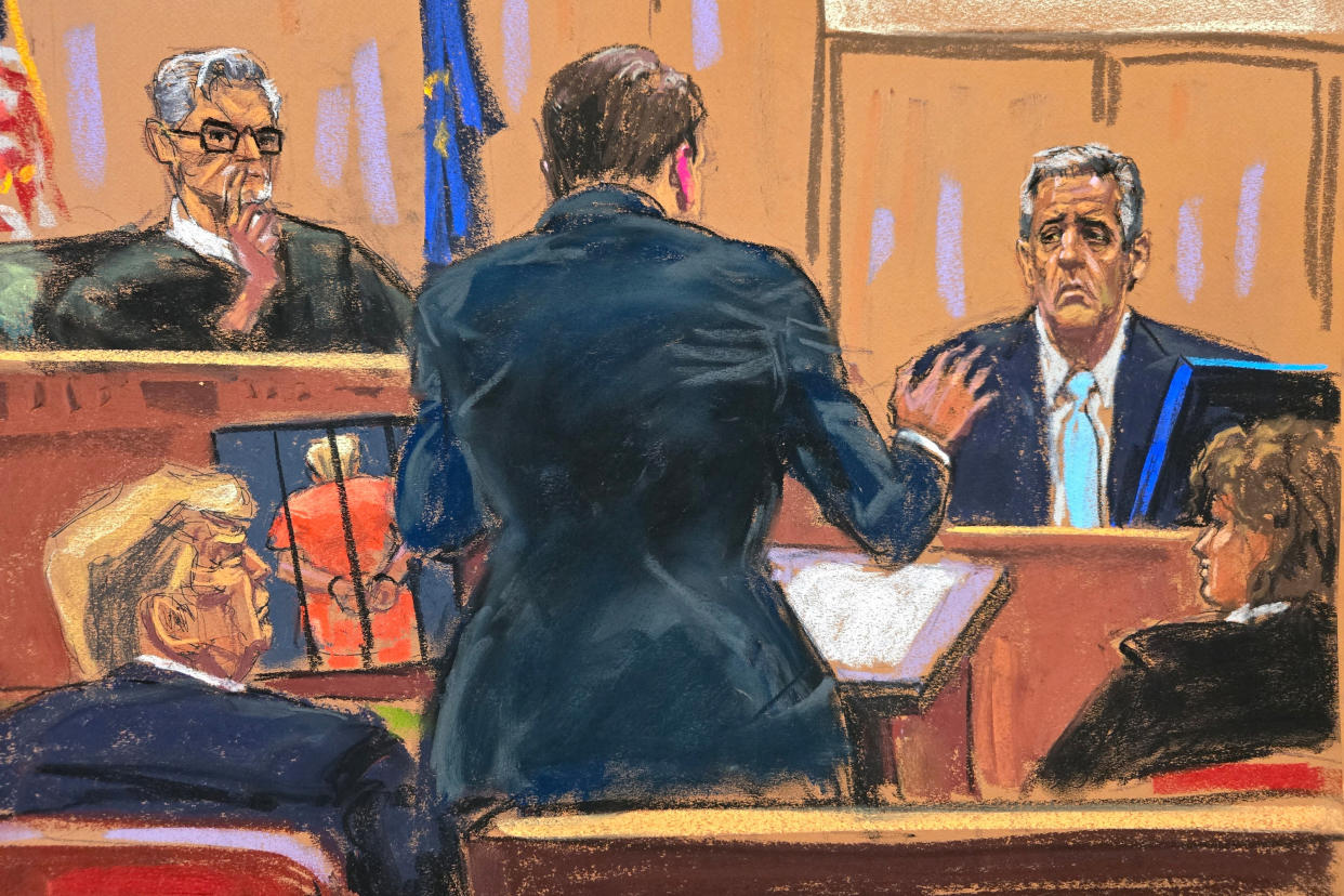 Michael Cohen is cross-examined by defense lawyer Todd Blanche on May 14 as Judge Juan Merchan, former President Donald Trump and his lawyer Susan Necheles look on.