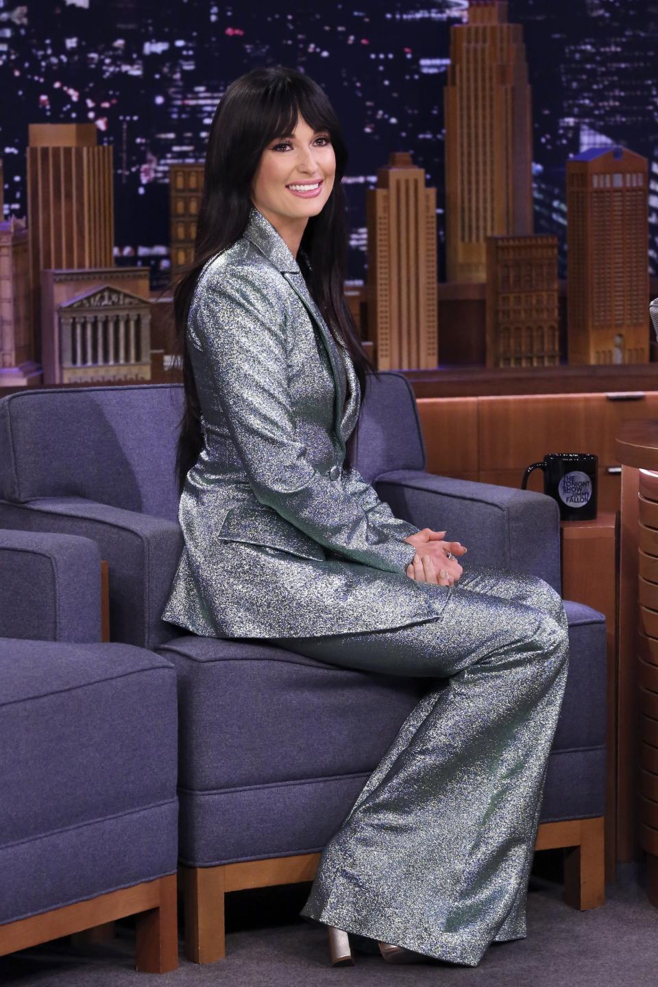 Kacey in Christian Siriano suit during The Tonight Show Starring Jimmy Fallon.