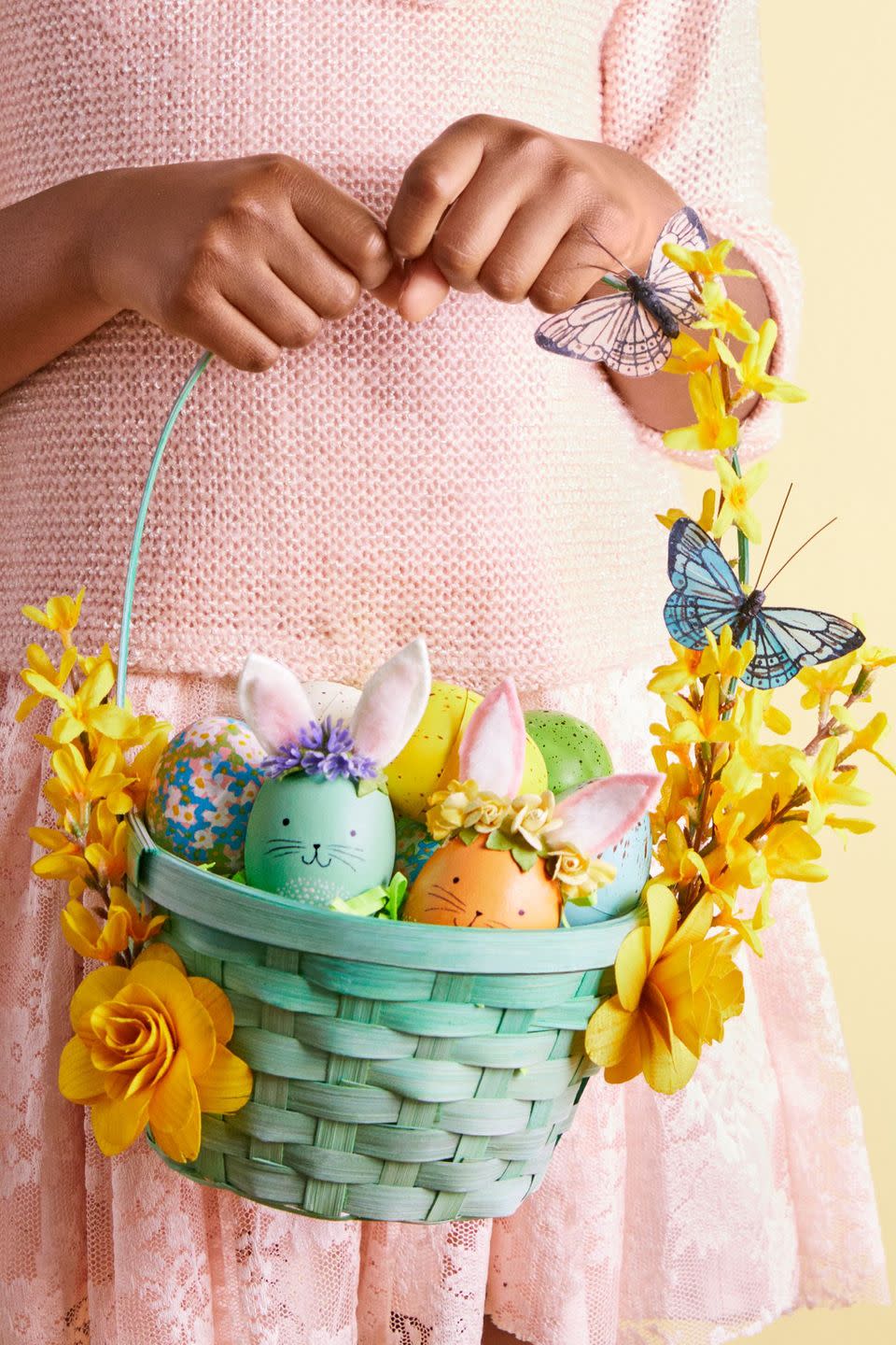 <p>There are no better signs of warmer weather than beautiful blossoms and high-flying butterflies. Use the faux variety to embellish a bamboo basket, and fill with floral, speckled, and bunny-inspired eggs for added whimsy.</p><p><strong>Woodland Bunny:</strong> Decorate a painted egg with soft, furry ears and a floral crown. Paint a wooden egg, let dry, then add a spotted belly with white paint. Draw on a face. Use template to make ears from felt and faux-fur trim. Sandwich wire between ear pieces, then bend back the bottom 1/4 in. and use to glue in place. Glue small faux flowers around ears.</p><p><strong>Floral Egg:</strong> A dyed egg can be a blank canvas for a watercolor garden. Paint small X's with dots in the centers.</p><p><strong>Speckled Egg:</strong> Use a toothbrush to flick watered-down acrylic paint across (dry) spray-painted plastic eggs.</p><p><a class="link " href="https://www.amazon.com/BCP-25pcs-Blank-Plastic-Easter/dp/B01LWE37EP/?tag=syn-yahoo-20&ascsubtag=%5Bartid%7C10070.g.1751%5Bsrc%7Cyahoo-us" rel="nofollow noopener" target="_blank" data-ylk="slk:SHOP WHITE PLASTIC EGGS;elm:context_link;itc:0;sec:content-canvas"><strong>SHOP WHITE PLASTIC EGGS</strong> </a></p>