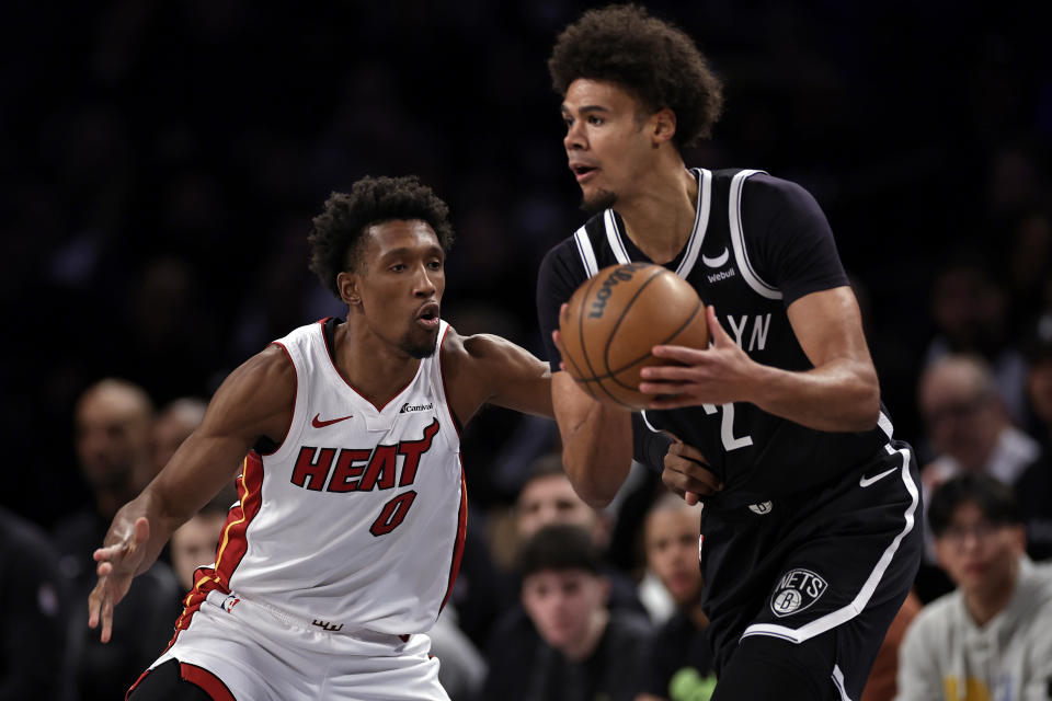 Miami Heat guard Josh Richardson defends against Brooklyn Nets forward Cameron Johnson during the first half of an NBA basketball game, Saturday, Nov. 25, 2023, in New York. (AP Photo/Adam Hunger)