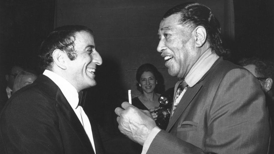 Tony Bennett and composer Duke Ellington share a laugh in the early 1970s. - Michael Ochs Archives/Getty Images