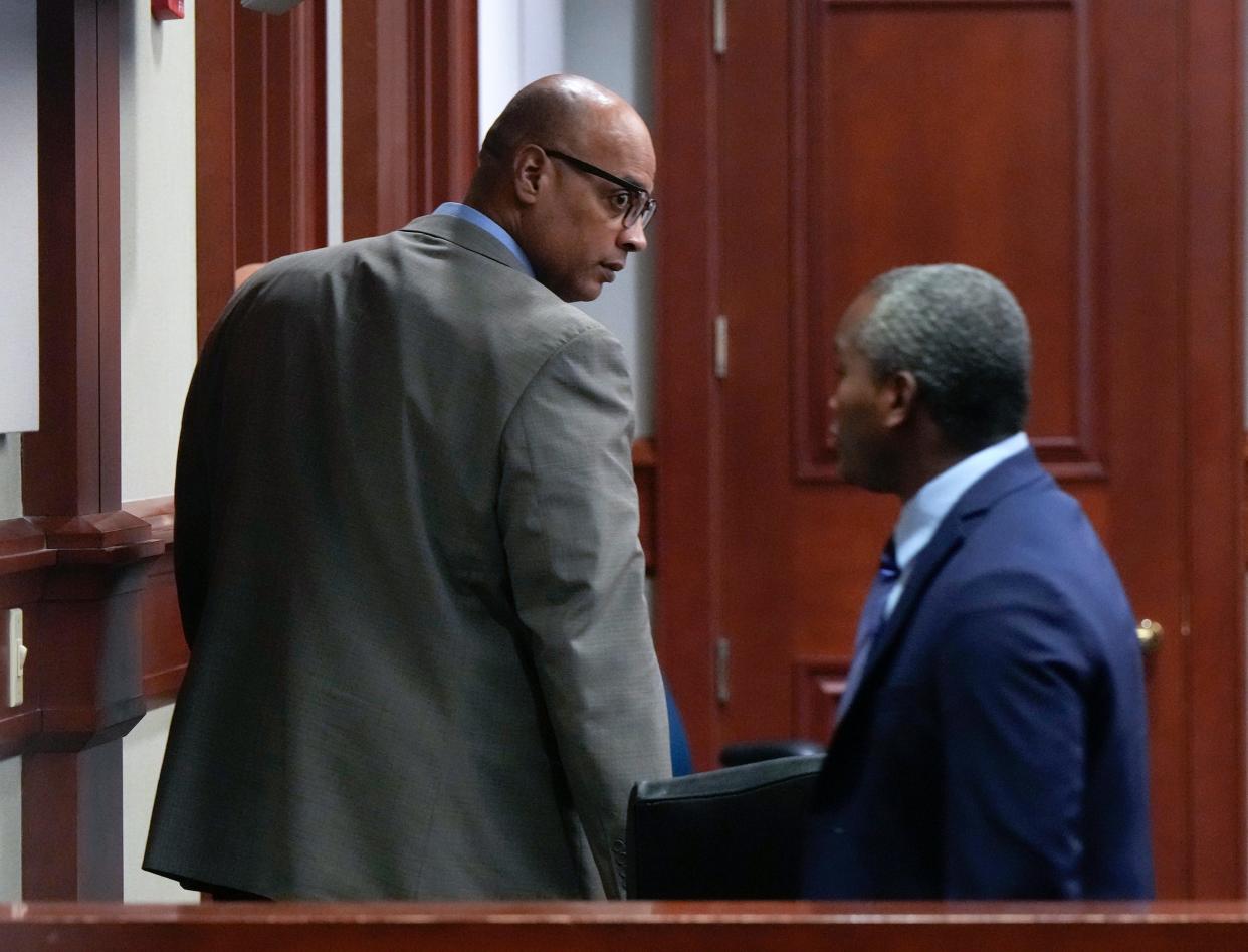 Troy Victorino and Jerone Hunter leave the courtroom after their sentencing trial is delayed, Thursday, April 27, 2023.