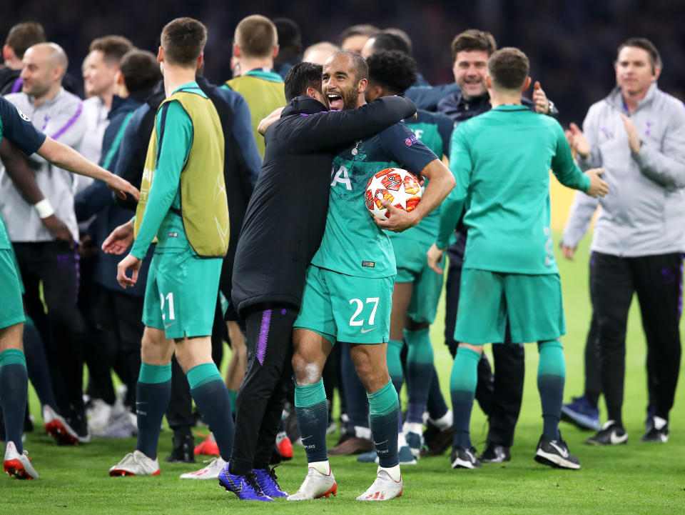 Players come together to celebrate moments after full-time