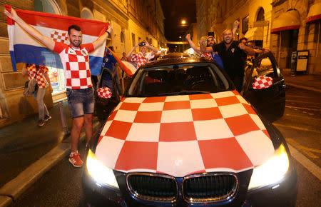 FILE PHOTO: Soccer Football - World Cup - Semi-Final - Croatia v England - Zagreb, Croatia - July 11, 2018. Croatia's fans celebrate after Croatia beat England in semi-final. REUTERS/Antonio Bronic/File Photo