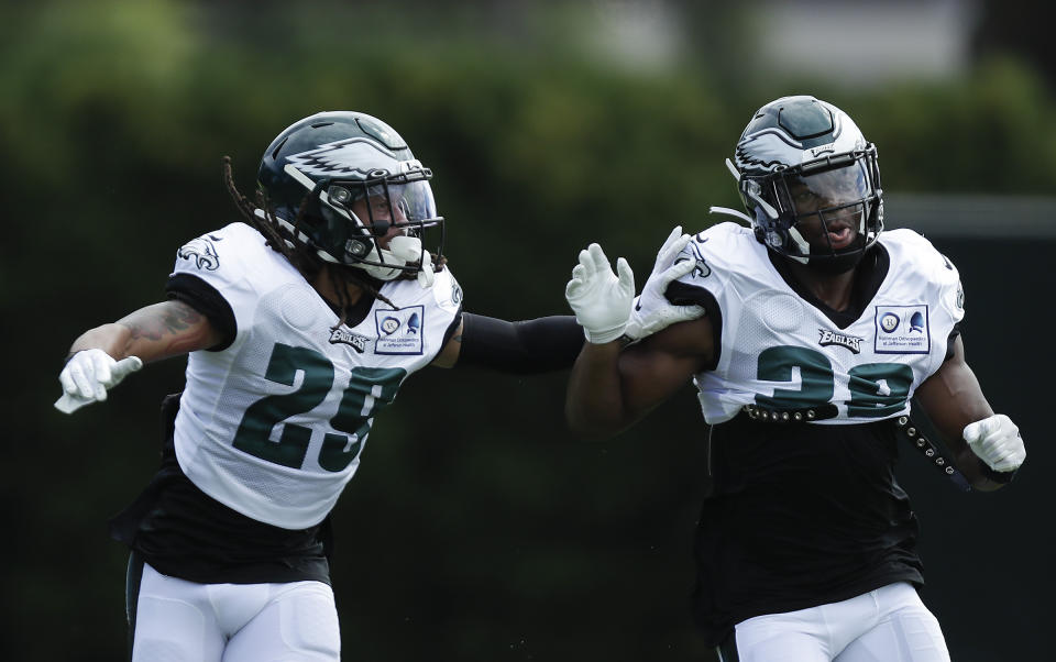 Philadelphia Eagles cornerback Avonte Maddox, left, and safety Rudy Ford work on coverage drills during an NFL football training camp practice in Philadelphia, Monday, Aug. 24, 2020. (Yong Kim/Pool Photo via AP)