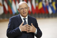 Portugal's Foreign Minister Augusto Santos Silva speaks with the media as he arrives for a meeting of EU foreign ministers at the European Council building in Brussels, Monday, May 10, 2021. EU Foreign Affairs Ministers meet in Brussels to discuss current affairs, tensions with Russia, the Western Balkans, transatlantic relations and Belarus. (AP Photo/Olivier Matthys, Pool)