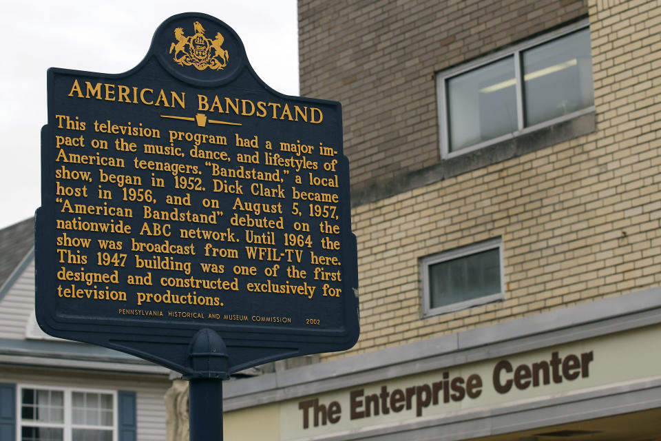 A marker to commemorate "American Bandstand" stands in front of the Enterprise Center, Wednesday, April 18, 2012 in Philadelphia. The Enterprise Center is located in the former American Bandstand studios. Dick Clark, the ever-youthful television host and producer who helped bring rock 'n' roll into the mainstream on "American Bandstand" and rang in the New Year for the masses at Times Square died at 82. (AP Photo/Alex Brandon)