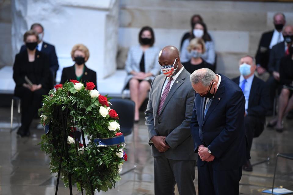 <p>Senator Tim Scott (R-SC) and Senator Chuck Schumer (D-NY) paid their respects at Representative Lewis's casket. </p>