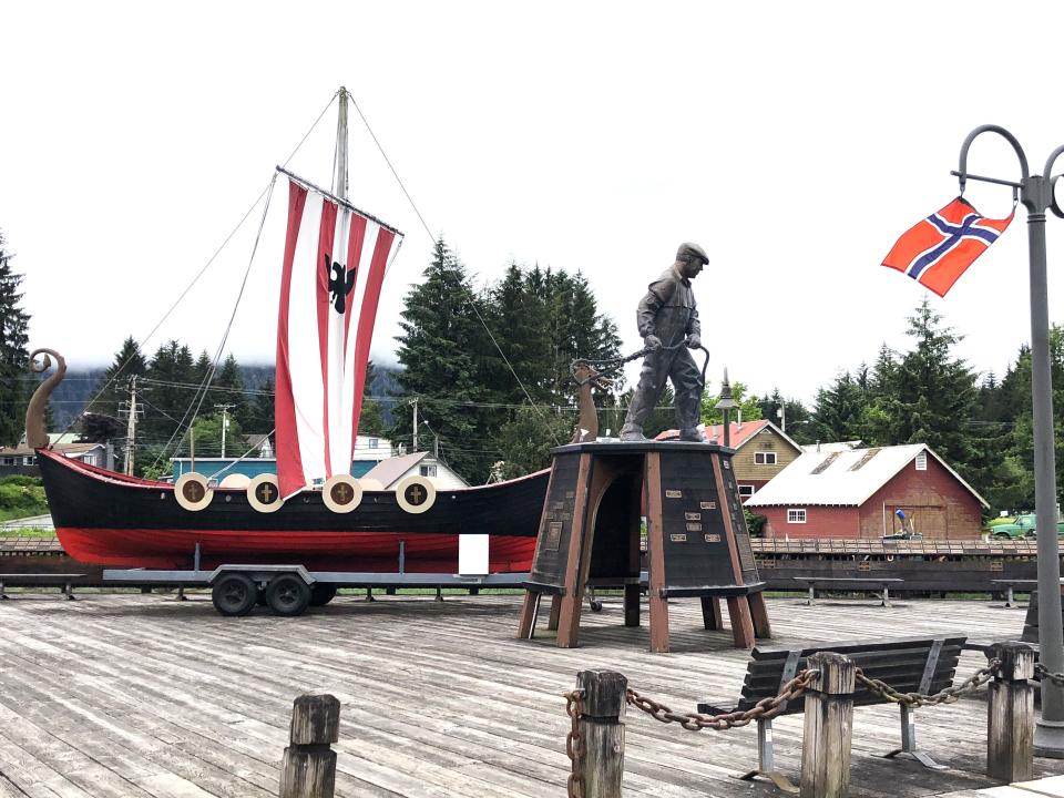 A ship on display with flags surrounding it