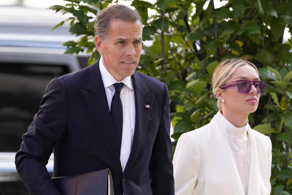 Hunter Biden, left, arrives to federal court with his wife, Melissa Cohen Biden, Friday, June 7, 2024, in Wilmington, Del. (AP Photo/Matt Slocum)