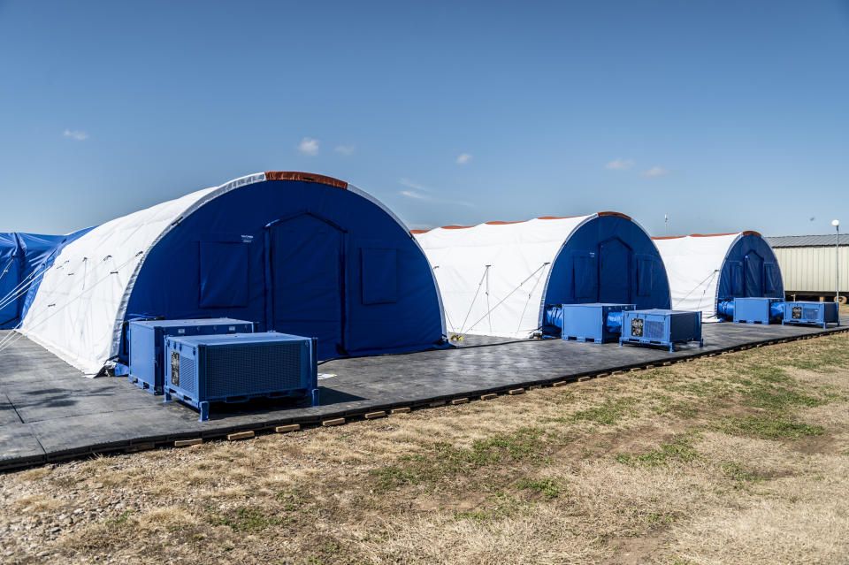 Intensive care tents sit in a row at a Influx Care Facility (ICF) for unaccompanied children on Sunday, Feb. 21, 2021 in Carrizo Springs, TX. / Credit: The Washington Post