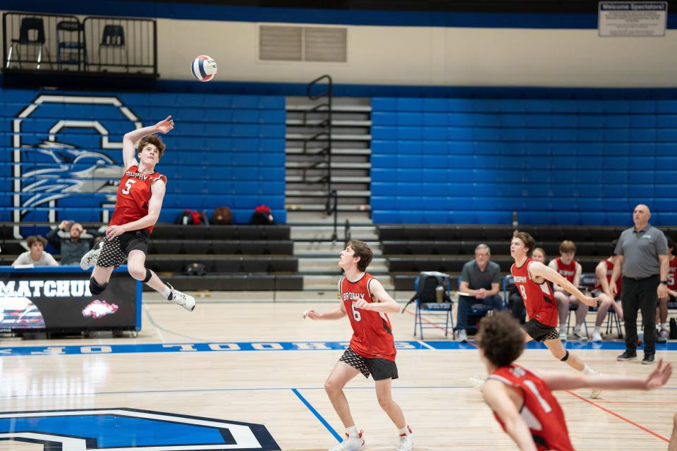 Brophy Broncos payer Patrick Oldani (6) sets the ball for Dylan Boyle (5) during a game against the Chandler Wolves on March 31, 2023, in Chandler, Ariz.