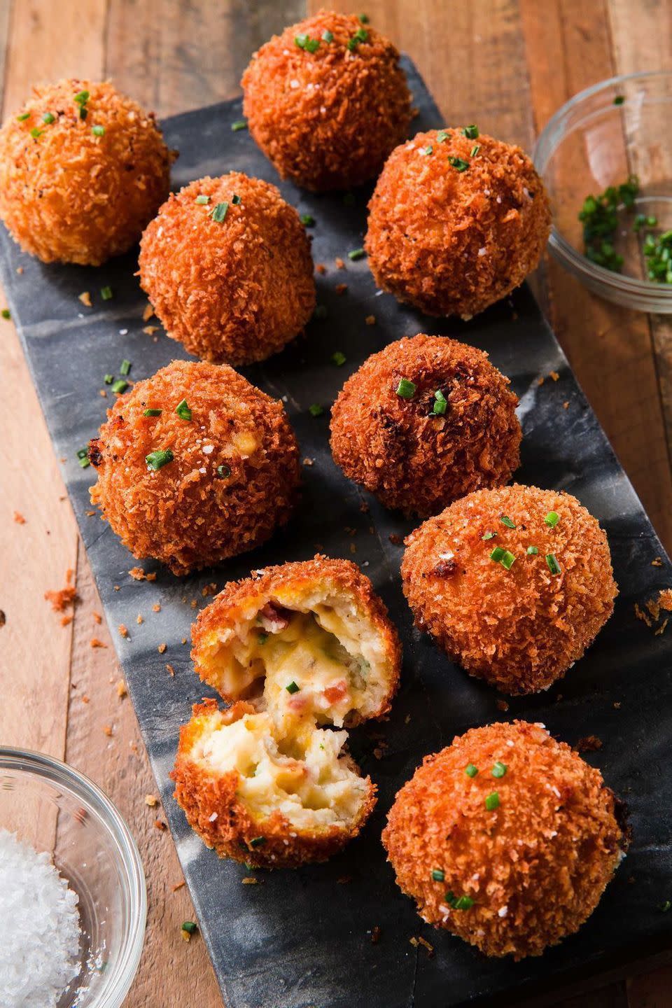 <p>This easy recipe turns those sad leftover mashed potatoes into something MAGICAL. </p><p>Get the <a href="https://www.delish.com/uk/cooking/recipes/a29245081/fried-mashed-potato-balls-recipe/" rel="nofollow noopener" target="_blank" data-ylk="slk:Fried Mashed Potato Balls;elm:context_link;itc:0;sec:content-canvas" class="link ">Fried Mashed Potato Balls</a> recipe.</p>