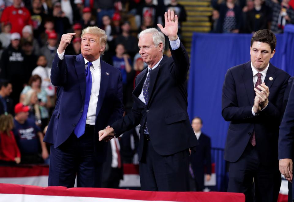 Then-President Donald Trump invites Sen. Ron Johnson to speak after he was introduced at the UW-Milwaukee Panther Arena where the president held a campaign rally Jan. 14, 2020. He was one of Trump's most vocal allies.