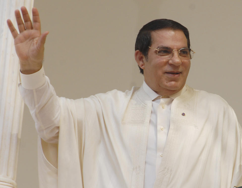 FILE - In this Aug.26 2009 file photo, Tunisian President Zine El Abidine Ben Ali waves to supporters after formally presenting his candidacy for the presidential elections, in Tunis. Tunisia's autocratic ruler Zine El Abidine Ben Ali, toppled in 2011, died in exile in Saudi Arabia. (AP Photo/Hassene Dridi, File)