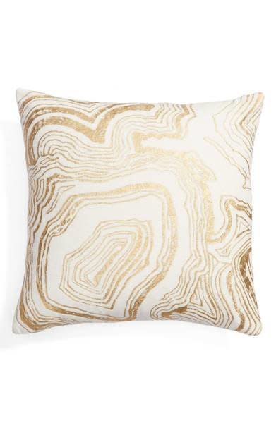 Get it <a href="https://shop.nordstrom.com/s/nordstrom-at-home-foil-print-pillow/4611053?origin=category-personalizedsort&amp;fashioncolor=PINK%20HERO" target="_blank">here</a>.&nbsp;