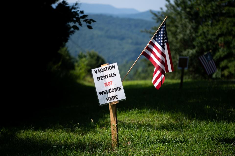 A sign reading "Vacation rentals not welcome here" is displayed in the Lone Mountain Shores community last summer.