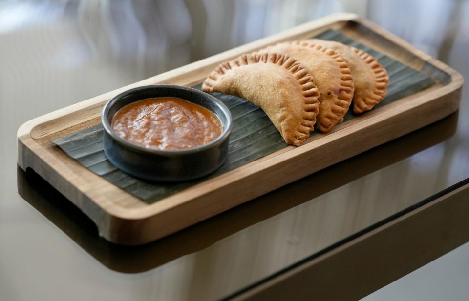 Ossobuco empanadas from FYR Short North, the restaurant and bar inside the second tower of the Hilton Columbus Downtown on North High Street