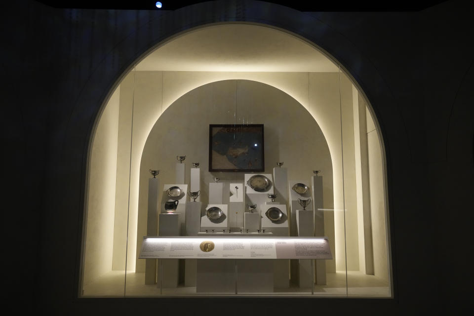 Tableware items are displayed in an area to tell the story of Roman emperor Nero's grand palace, called the Domus Aurea (Golden House), which was unfinished by Nero's death in AD 68, during a media preview for the "Nero: the man behind the myth" exhibition, at the British Museum in London, Monday, May 24, 2021. The exhibition, which open to visitors on May 27 and runs until October 24, explores the true story of Rome's fifth emperor informed by new research and archaeological evidence from the time. (AP Photo/Matt Dunham)