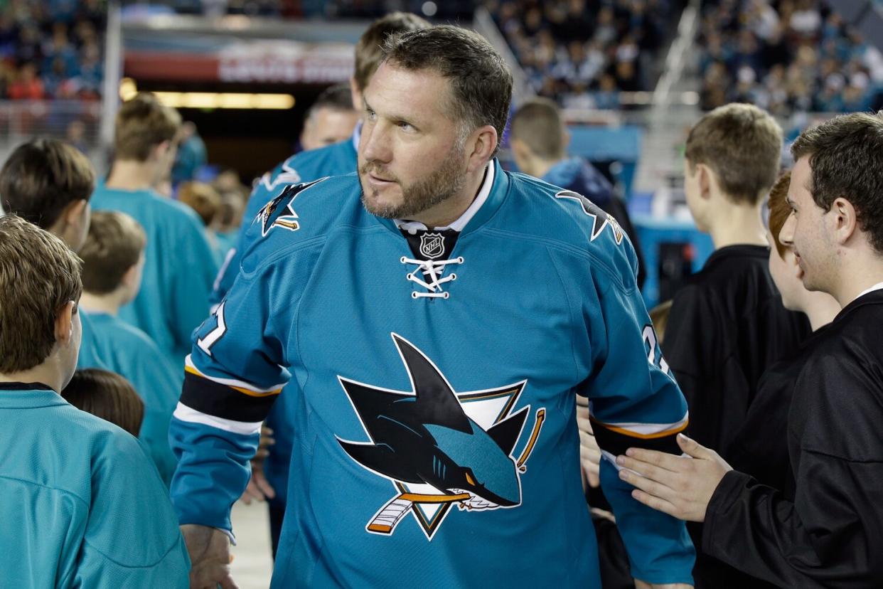 San Jose Sharks alumni Brian Marchment walks on to the field before the 2015 Coors Light NHL Stadium Series game between the Los Angeles Kings and the San Jose Sharks at Levi's Stadium