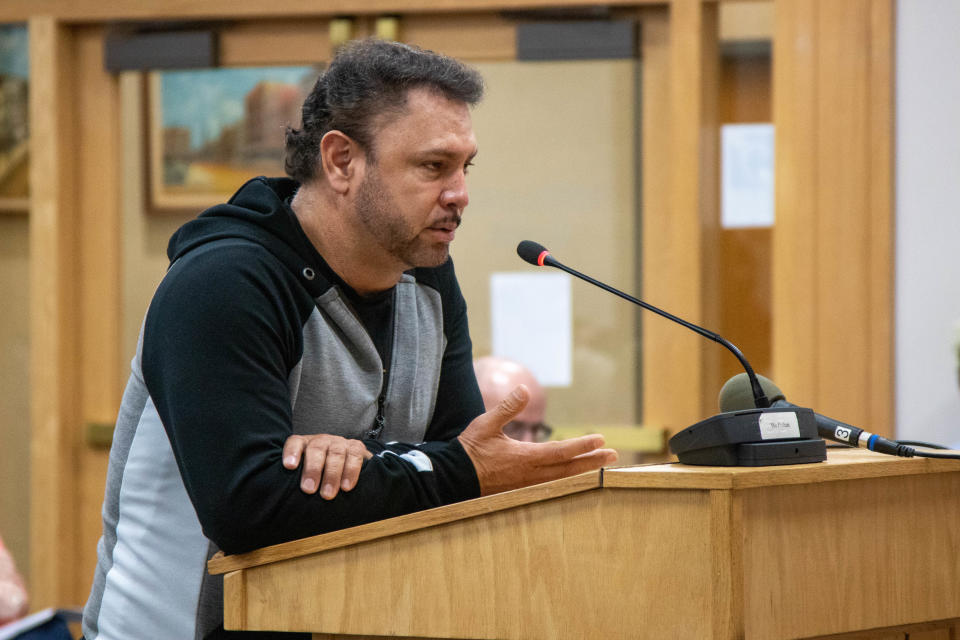 Benito Muñoz speaks with the Tippecanoe County Commissioners regarding the rezoning of his property for rodeos and concerts, on May 2, 2022, in Lafayette. The rezoning was voted down unanimously.