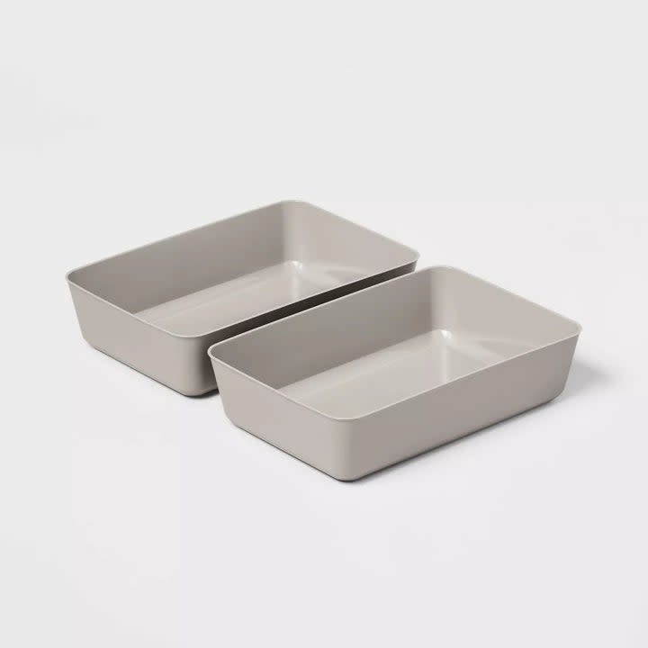 two gray storage trays