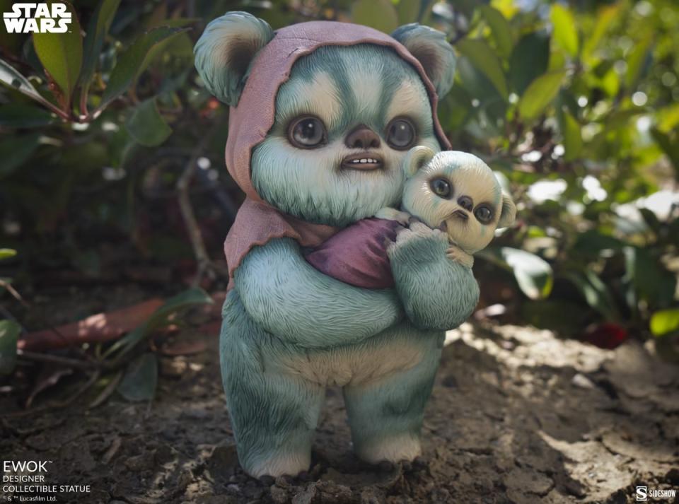 Back of Ewok holding a baby statue