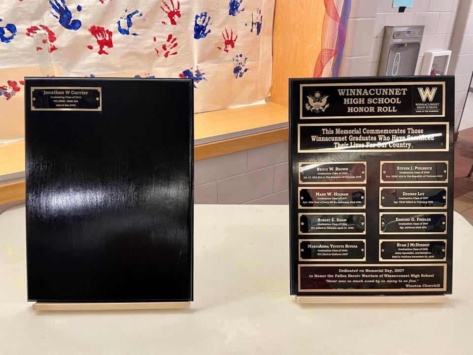 The Alumni Association’s Military Honor Roll Plaque "honors the fallen heroic Warriors of Winnacunnet High School."