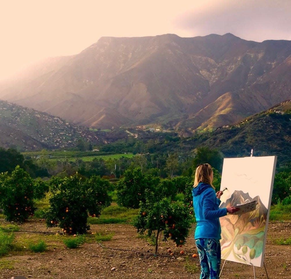 Ojai artist Susan Guy paints in the wilderness. Guy will participate in the Ojai Studio Artists Tour beginning Saturday.