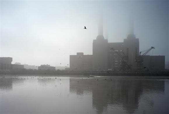 Battersea Power Station is shrouded in fog on the River Thames in London March 15, 2012.