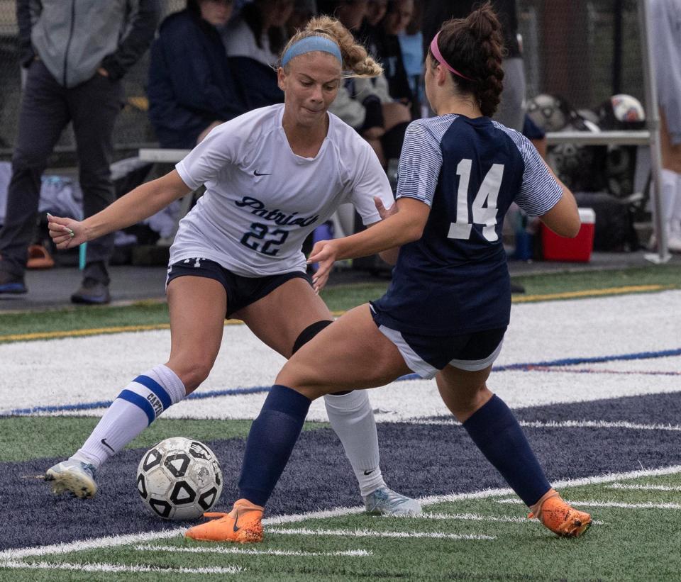 Freehold Township's Cassidy Corcione (white jersey) is signing with Michigan State