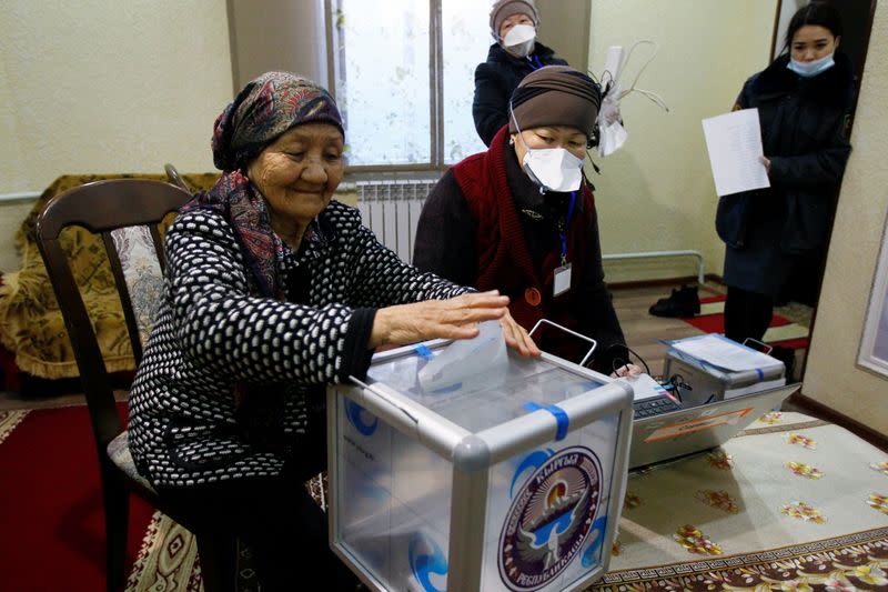 People take part in the election of Kyrgyz president and a referendum on the form of government in Koy-Tash