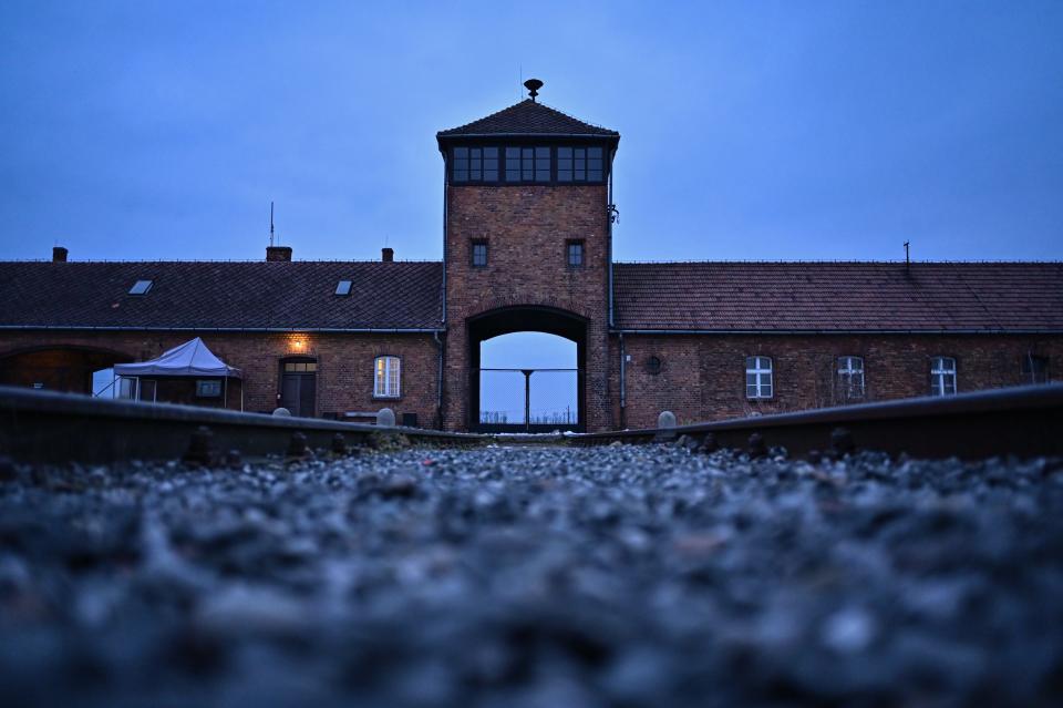 A view of the main entrance and train track at the former Nazi death camp Auschwitz Birkenau on January 26, 2023 in Oswiecim, Poland.