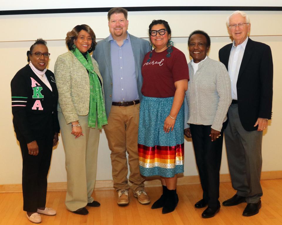 Gathering for a photo after the “Roots of Indigenous Heritage” presentation are Larrissa Henderson, Ruby Miller, Chris Siewers and his wife Lavita Hill, Cassandra Osborne and Jim Palmer. Palmer and Ruby Miller are co-chairs of the "Roots of America" exploration of cultures series in Oak Ridge.