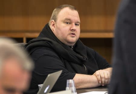 German tech entrepreneur Kim Dotcom sits in a chair during a court hearing in Auckland, New Zealand, September 24, 2015. REUTERS/Nigel Marple/File Photo