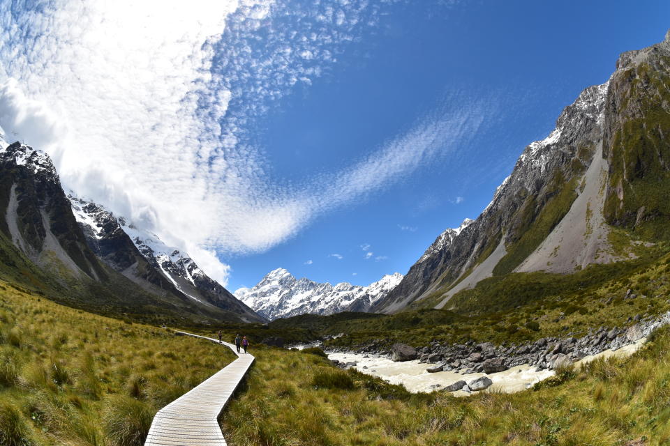 This Dec. 21, 2019, photo taken with a fisheye lens shows Mt. Cook and a boardwalk section of the Hooker Valley Track that leads to Hooker Glacier on the South Island of New Zealand. (Malcolm Foster via AP)