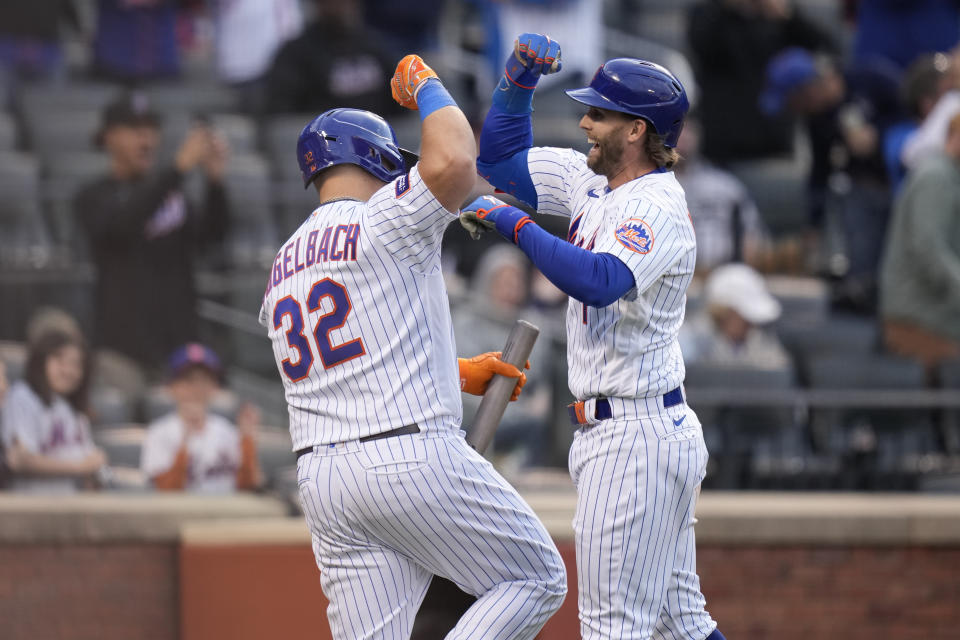 New York Mets' Jeff McNeil, right, celebrates after his home run with Daniel Vogelbach during the eighth inning of the second baseball game of a doubleheader against the Atlanta Braves at Citi Field, Monday, May 1, 2023, in New York. (AP Photo/Seth Wenig)