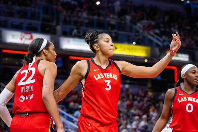 Forward A'ja Wilson reacts with teammate Forward Candace Parker of