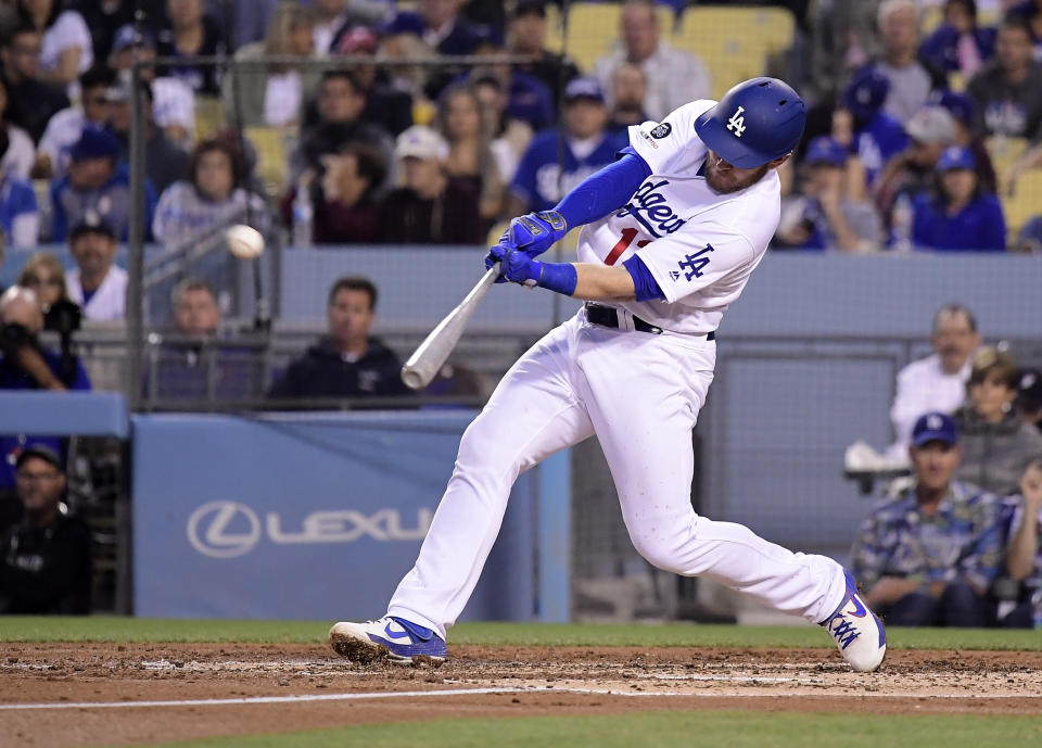 Los Angeles Dodgers' Max Muncy hits a two-run home run during the third inning of a baseball game against the Philadelphia Phillies Friday, May 31, 2019, in Los Angeles. (AP Photo/Mark J. Terrill)