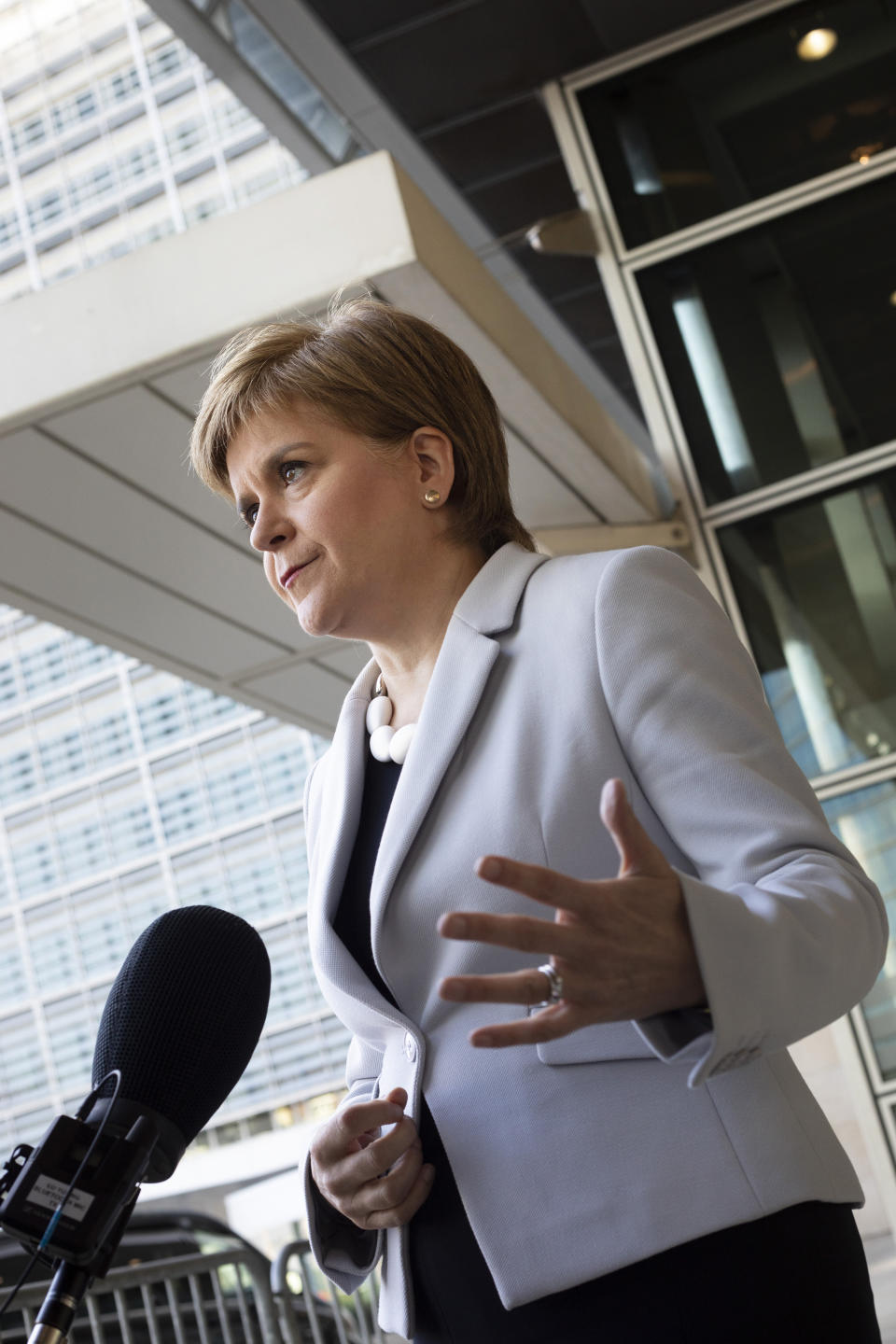 Scotland's First Minister Nicola Sturgeon speaks with journalists outside EU headquarters in Brussels, Tuesday, June 11, 2019. Scottish First Minister Nicola Sturgeon is in Brussels Tuesday to meet with European Union chief Brexit negotiator Michel Barnier and European Commission President Jean-Claude Juncker. (AP Photo/Virginia Mayo)