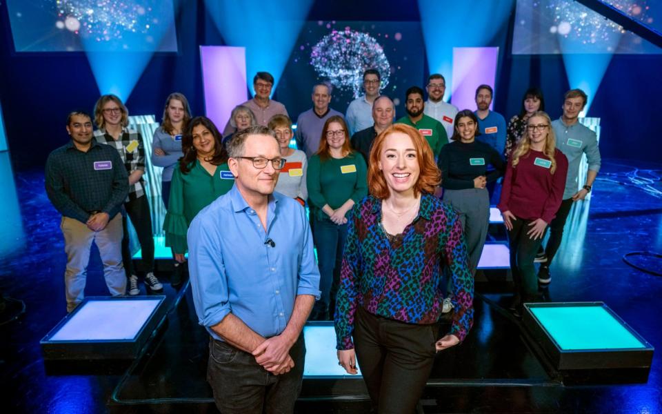 Michael Mosley and Hannah Fry demonstrate the test with a group of volunteers - BBC