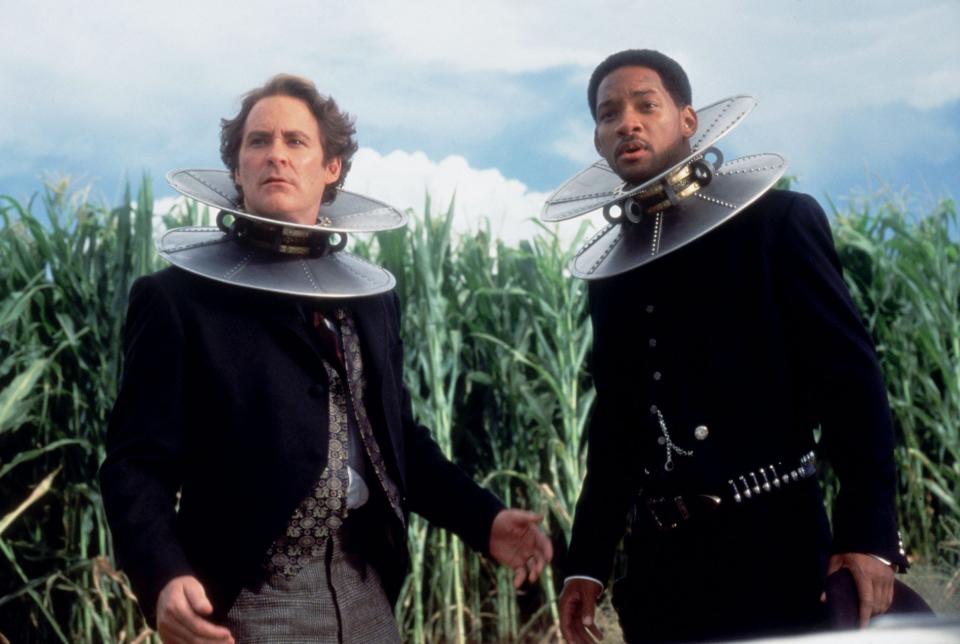 Artemus Gordon (Kevin Kline, left) and James West (Will Smith) are forced to wear magnetic collars in the Western comedy adventure "Wild Wild West."