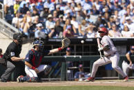 Oklahoma's Kendall Pettis, right, dodges a pitch by Mississippi catcher Hayden Dunhurst for the fourth ball to walk with bases loaded and bring a runner in to score against Mississippi in the seventh inning in Game 2 of the NCAA College World Series baseball finals, Sunday, June 26, 2022, in Omaha, Neb. (AP Photo/Rebecca S. Gratz)