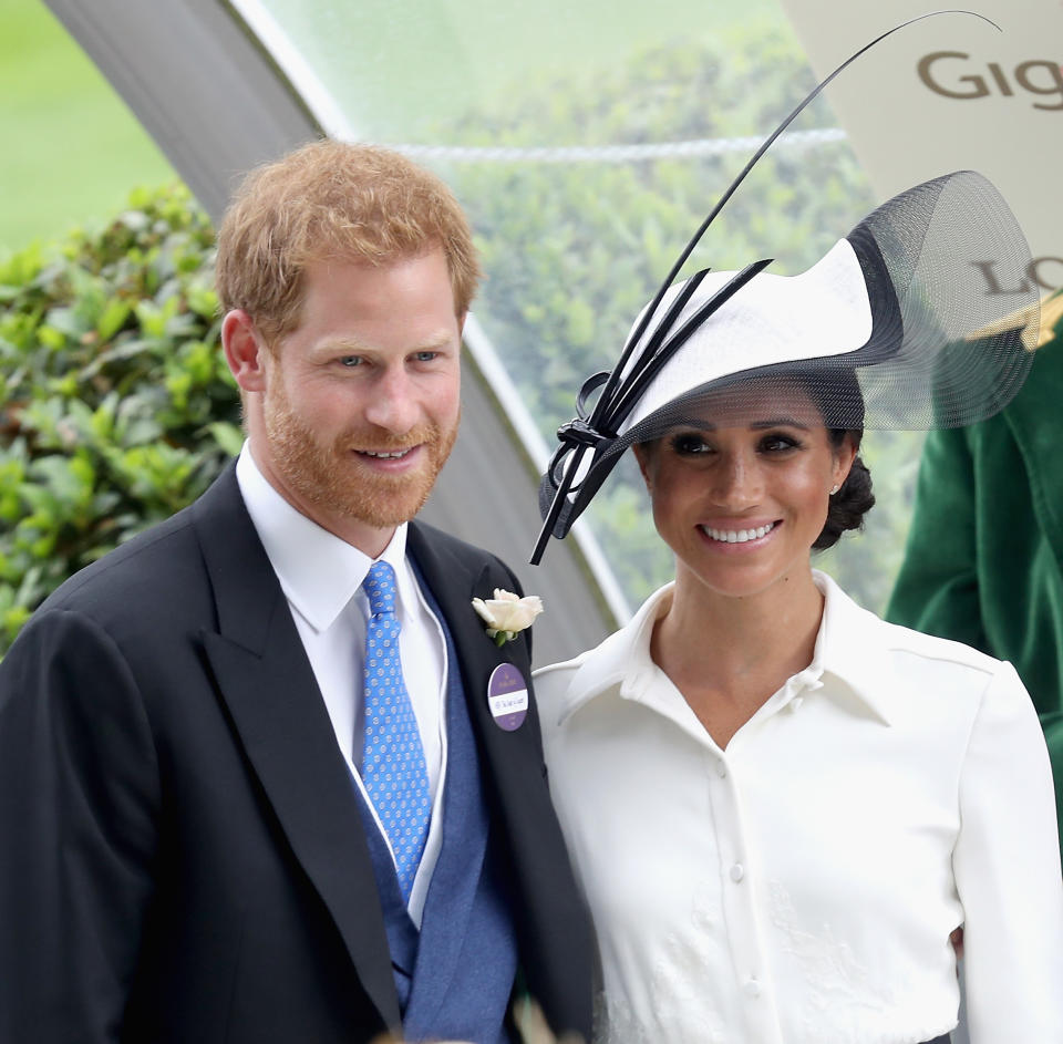 Prince Harry and Meghan Markle are unlikely choices for godparents according to bookmakers. Image via Getty Images.